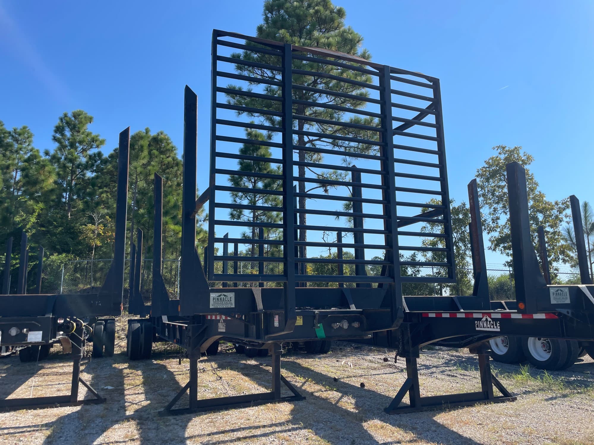 2023 McLendon 42ft Recessed Center HR Log Trailer