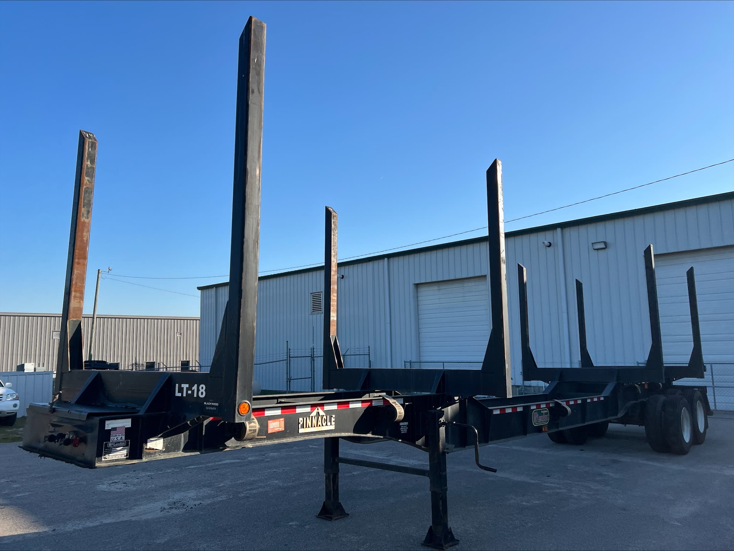2022 McLendon 42ft Recessed Center Log Trailer
