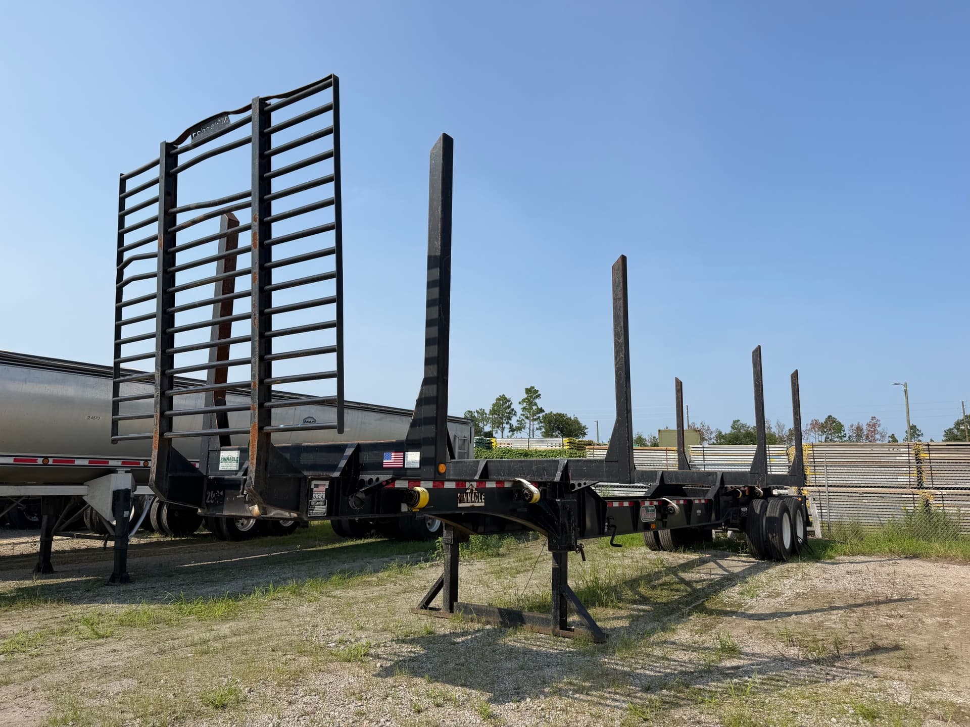 2022 McLendon 42ft x 102in x 13ft Recessed Center HR Log Trailer