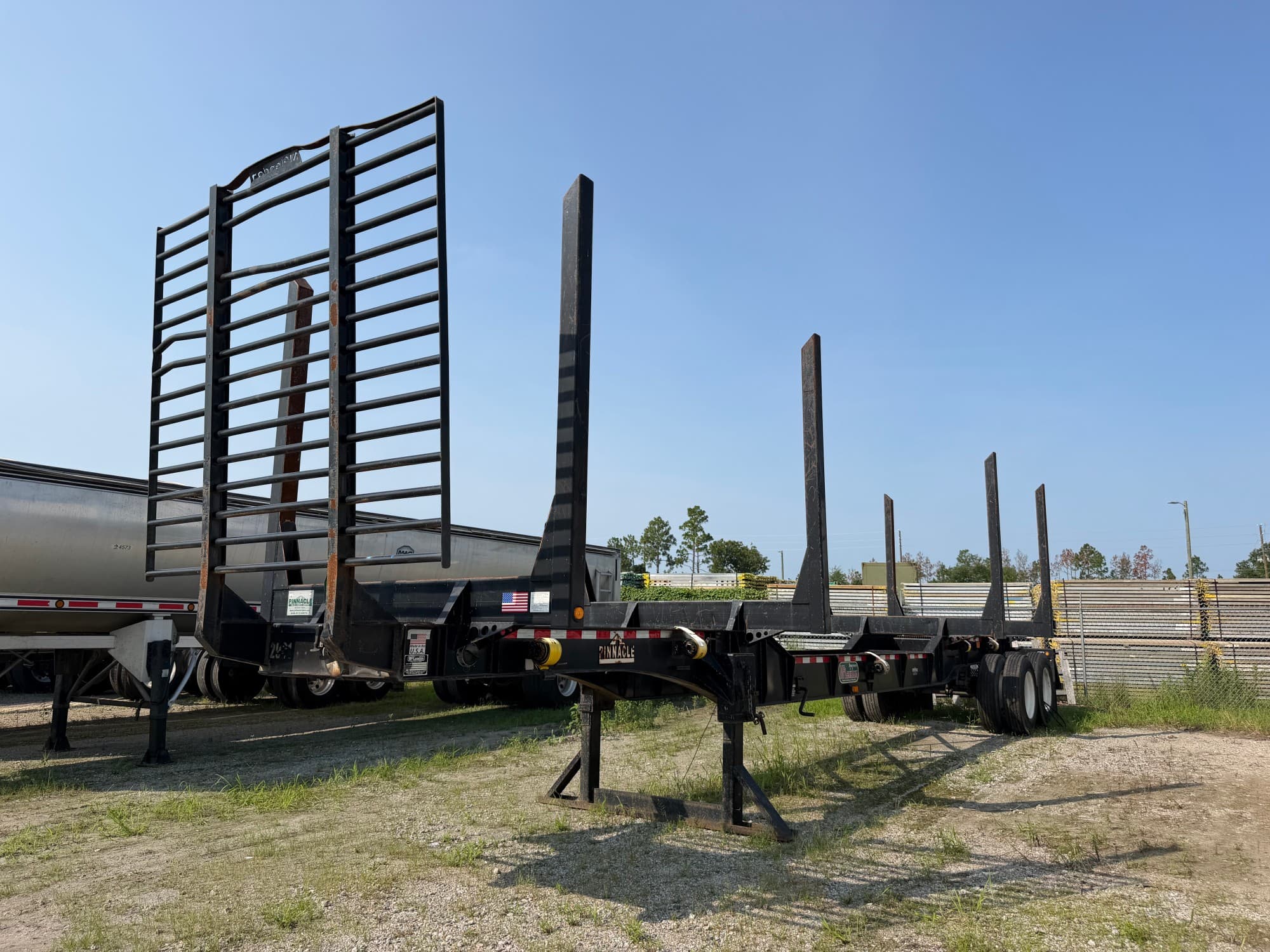 2022 McLendon 42ft x 102in x 13ft Recessed Center HR Log Trailer
