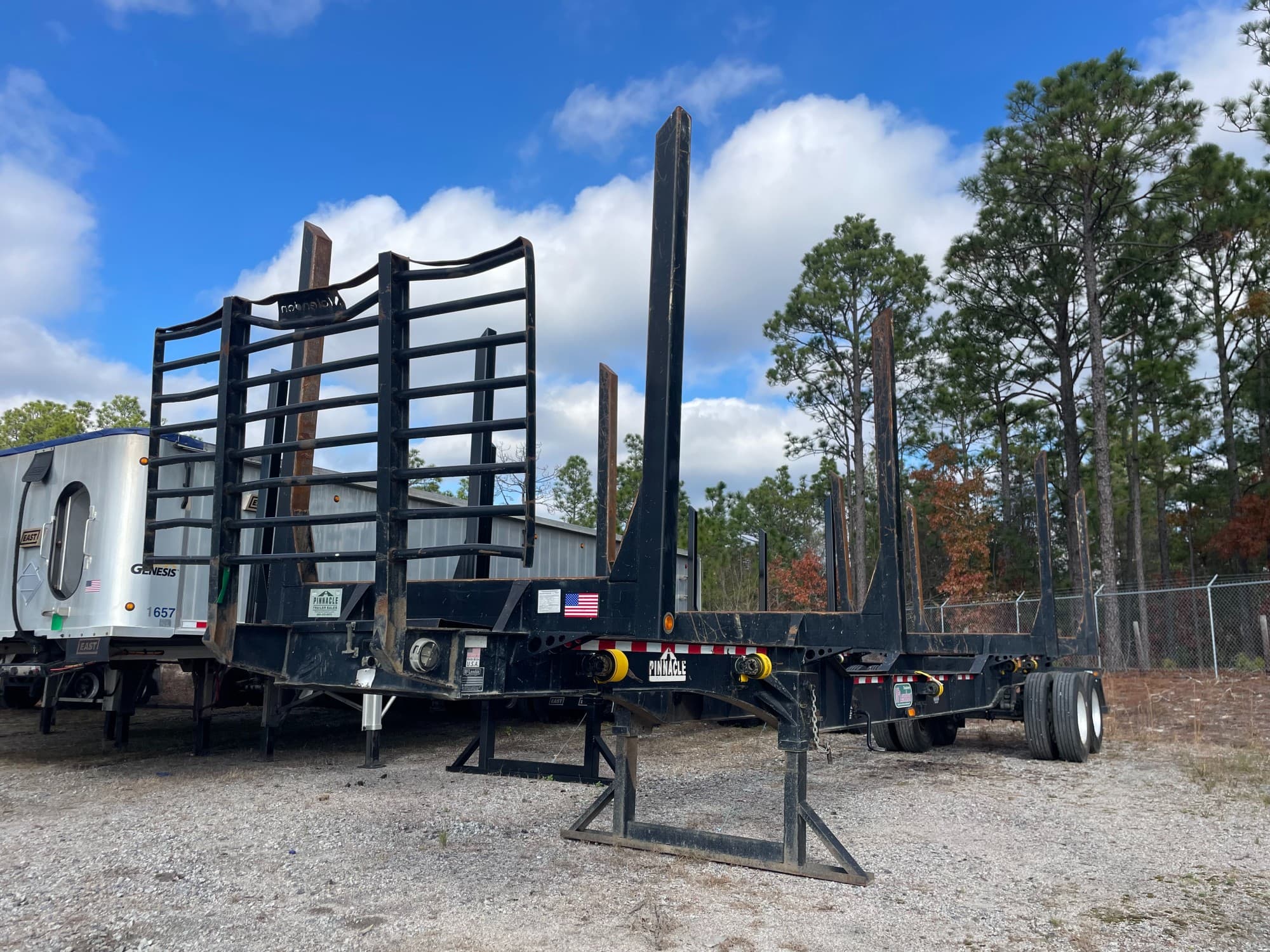 2021 McLendon 42ft x 102in x 13ft Recessed Center HR Log Trailer