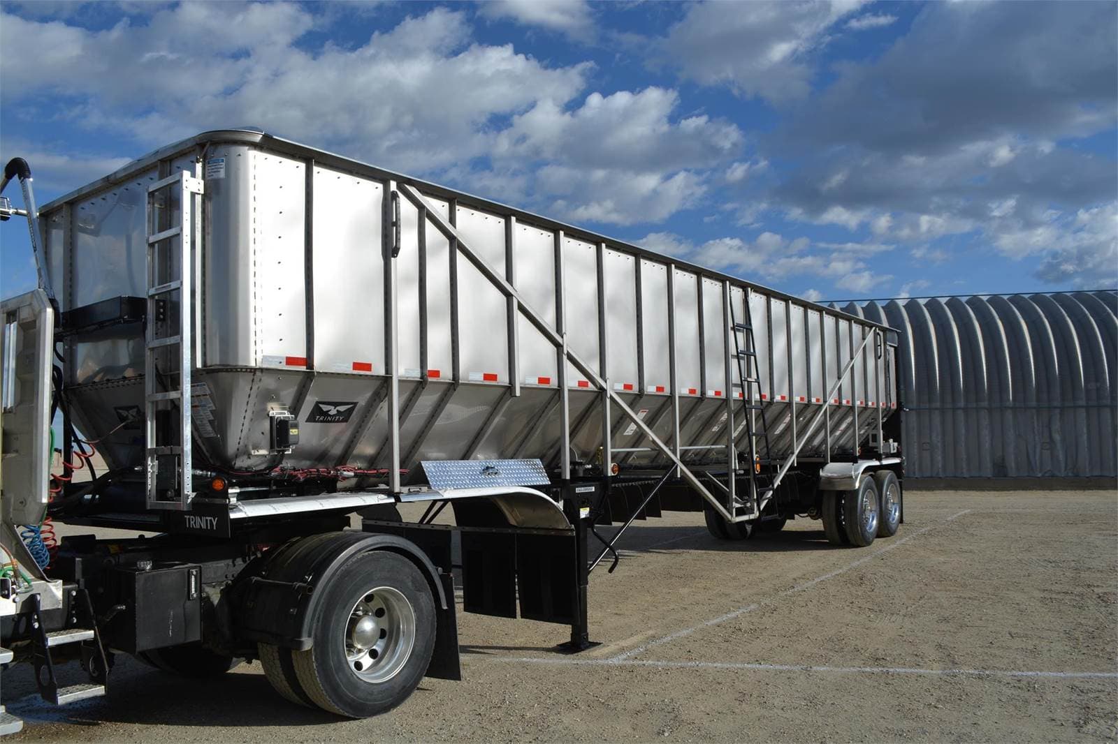 2027 Trinity 42x102 Tandem Axle Stainless Steel Belt Trailer - Air Ride, Fixed Axle