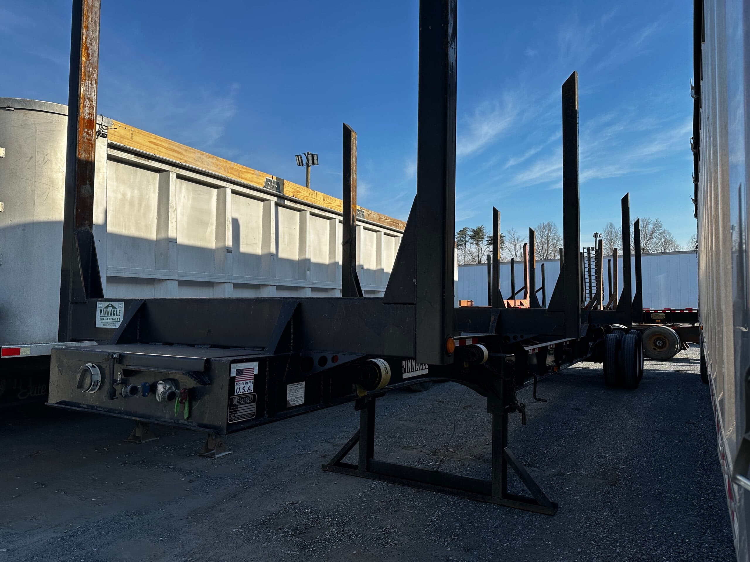 2022 McLendon 42ft Recessed Center Log Trailer
