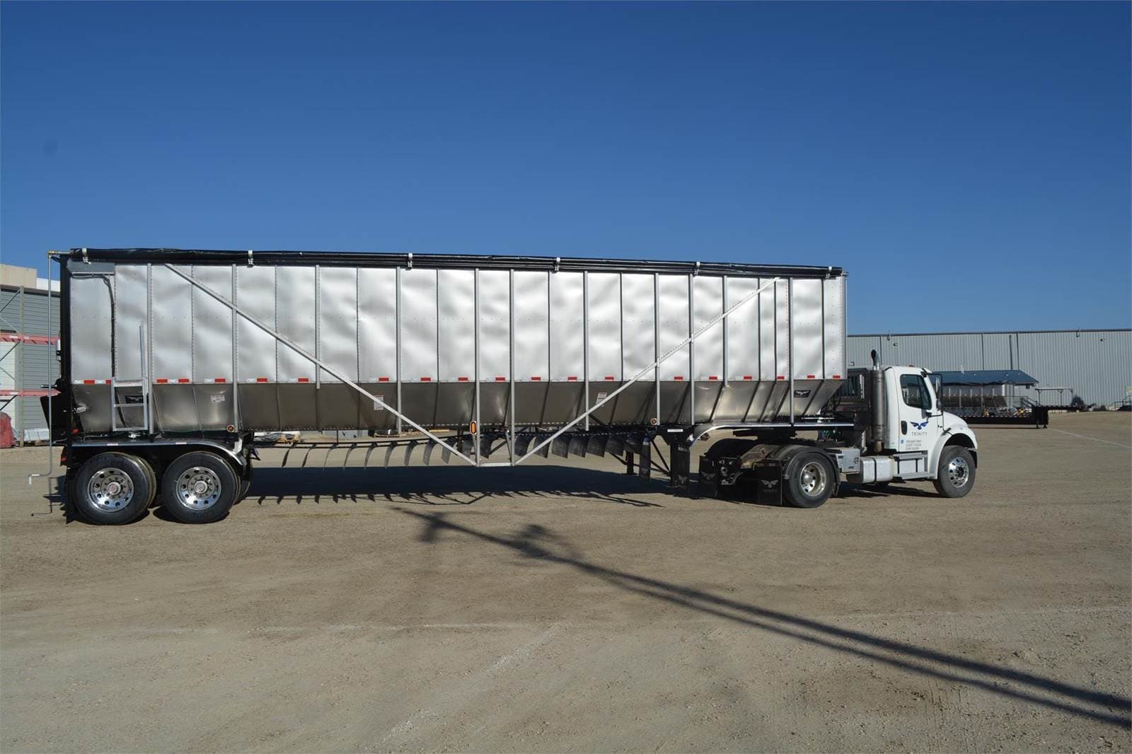 2027 Trinity 42x102 Tandem Axle Stainless Steel Belt Trailer - Air Ride, Fixed Axle