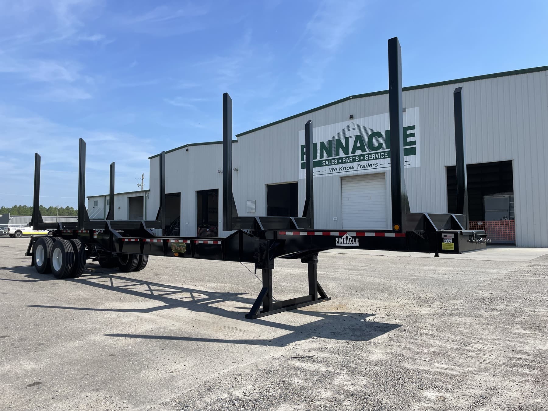 2027 McLendon 42ft x 102in x 13ft Recessed Center Log Trailer